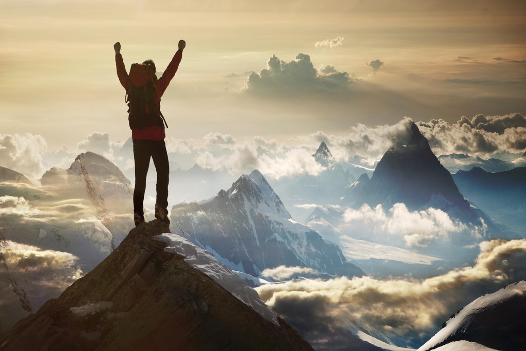 Amazon.com: Climber Standing on Mountain Summit Inspirational